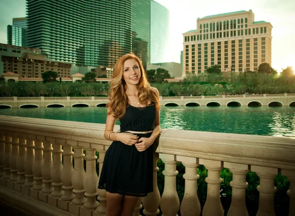 Las Vegas Strip senior portraits senior girl in a black dress posing in front of the Bellagio fountains